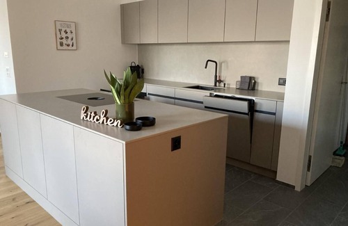 Laax Apartment | "Casa Riva" holiday flat with mountain and lake views