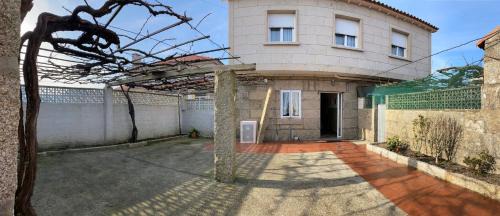 O Grove House | CASA TUCHO