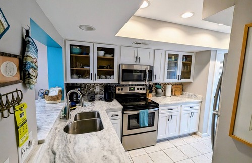 Oceanmarsh Subdivision Condo | Casa Wanderlust at Harbor Island #K204