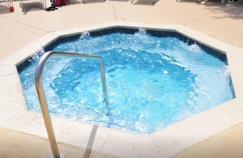 Windsor Palms Condo | CasaComfort near Disney-King Suite bedroom, FREE Amenities, and great location.