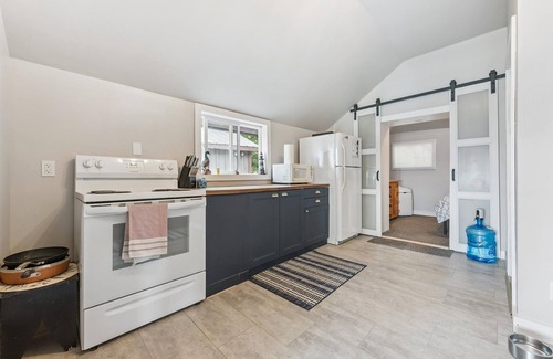 Dyer's Bay House | Cedar & Stone is a TICO licenced serene waterfront escape in exclusive Dyers Bay. Nestled between Georgian Bay and the Niagara Escarpment, this stylishly renovated cottage offers peaceful mornings, cozy evenings, and nature right at your doorstep.