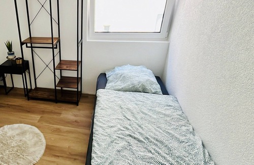 Seelberg Apartment | Central 1-room apartment kitchen, washing machine, parking space, flexible sleeping area