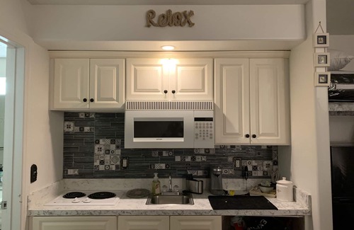 North End Apartment | Central Location - Short walk to Beach/Boardwalk w/parking and heated pool!