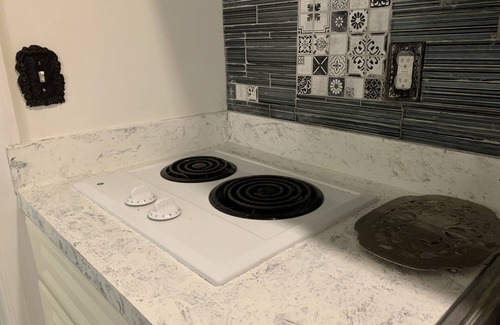 North End Apartment | Central Location - Short walk to Beach/Boardwalk w/parking and heated pool!