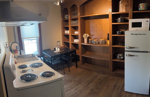 Camrose House | Century home suite located above a 5 star restaurant, In the heart of downtown!