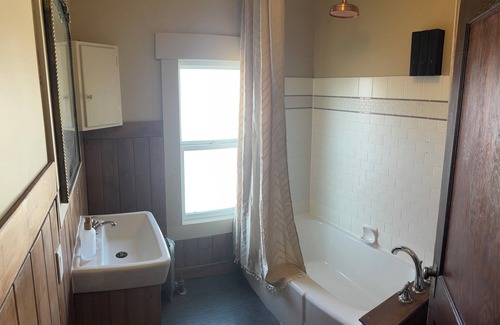 Camrose House | Century home suite located above a 5 star restaurant, In the heart of downtown!