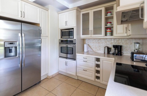 Black Rock Apartment | Chaconia Suite, a stunning luxurious beach front self catering apartment