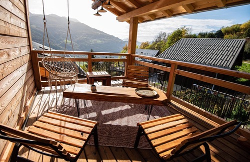 La Plagne-Tarentaise Ski Chalet | Chalet de Standing facing the mountains