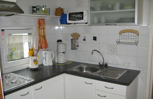 Onderdijk Apartment | Chalet directly on the canal with its own jetty