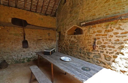 La Carneille Cottage | Charming 15th Century Cottage with Garden, Fishing Pond, and Historic Village Setting