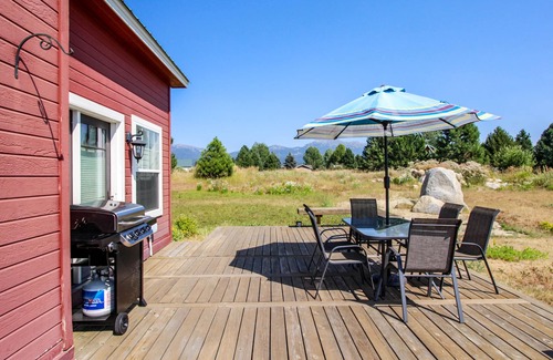 McCall House | Charming and spacious country home with furnished back deck and mountain view