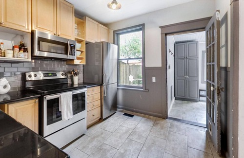 The Beaches House | Charming Beaches Century House, Steps to the Beach & Shops, Downtown in 10 min!
