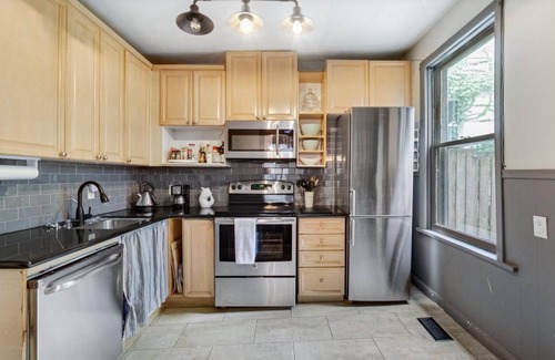 The Beaches House | Charming Beaches Century House, Steps to the Beach & Shops, Downtown in 10 min!