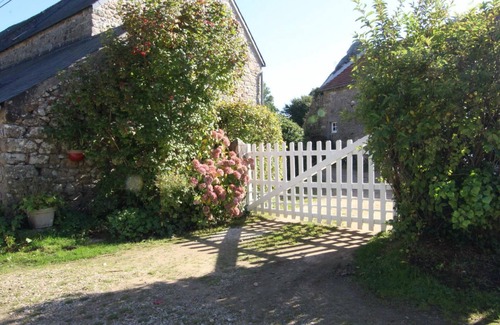 Theville Cottage | Charming Coastal Cottage with Fireplace, WiFi, Terrace, and Garage - Pets Welcome!