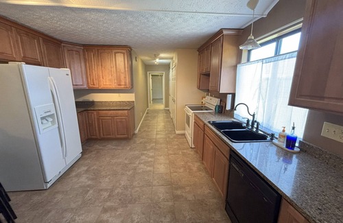 Collinsville House | Charming Home Tucked Away and Near Major Restaurants and Stores