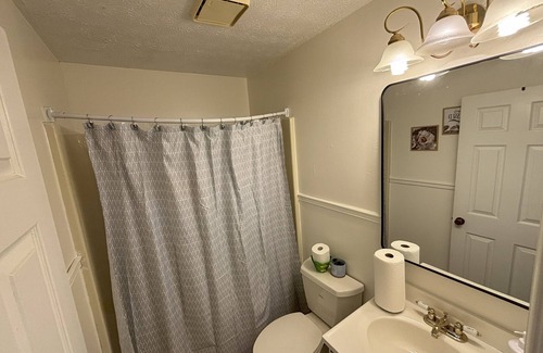 Collinsville House | Charming Home Tucked Away and Near Major Restaurants and Stores