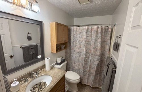 Collinsville House | Charming Home Tucked Away and Near Major Restaurants and Stores