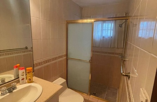 San Pedro Sula Hotel | Charming hotel room near City Mall with Pool, grill, and kitchen