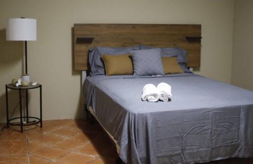 Rio Grande House | Charming Jayuya room with City, Garden, and Mountain Views