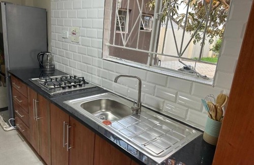 Lusaka Cottage | Charming Mango Cottage in Lusaka – Garden Views & Free WiFi