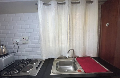 Lusaka Cottage | Charming Mango Cottage in Lusaka – Garden Views & Free WiFi