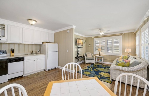 Midtown Ocean City Cottage | Charming Oceanblock Cottage just steps to beach! FREE LINENS