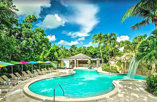 Rock Harbor Hotel | Charming Waterfront Gateway in Key Largo! Outdoor Pool, Beach, Pets Allowed!