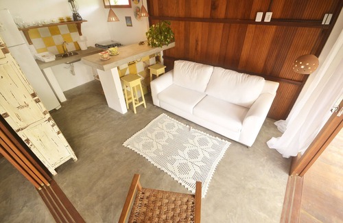 Barra Grande House | Charming Yellow Bungalow on Algodões Beach with full kitchen.