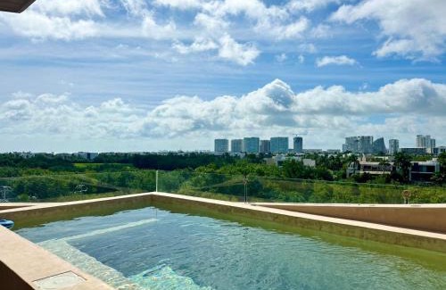 Downtown Cancun Apartment | Chichén 27 Departamentos nuevos con piscina cerca de Ferry a Isla Mujeres