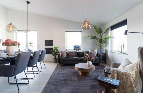 Bastad House | Chocolaty Warmth Home 3BR Flat with Cozy Balcony