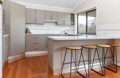 Elizabeth Beach House | Clarabelle Cottage light and bright open plan living overlooking beautiful bushland setting