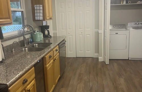 East Arlington House | Come and enjoy your stay at our home on the 18th hole of Blue Sky Golf Club.