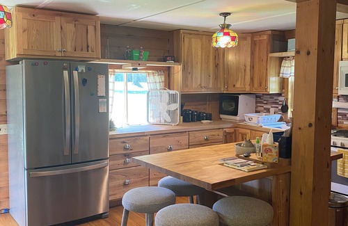 Manistique Cabin | Come relax at the cabin on Indian lake. The outdoors awaits you and your pets.