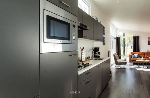 Beekbergen-Zuid Ski Chalet | Comfortable chalet with outdoor spa