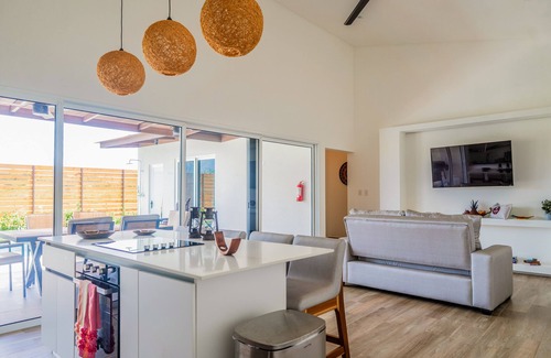 Esterillos Este House | Comfortable coastal retreat with pool, gas grill & near-beach location