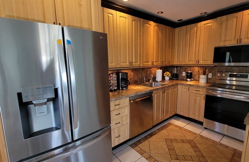 Harbor Village Condo | Comfortable Condo with Pool & Fishing Dock – Walk to the Beach, No Car Needed!