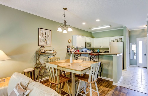 Little River House | Comfortable townhome with loft, shared pool, WiFi, AC, & W/D - near beach & golf