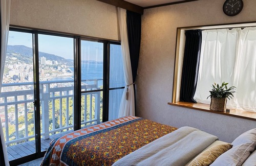 Atami Villa | [Completely rented one building] Overlooking the fireworks, the city, the night view, and the ocean view