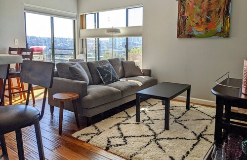 East Queen Anne Apartment | Condo w/ beautiful view of the Seattle Skyline, private patio, and rooftop deck!
