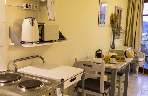 Karvelas Apartment | Cool, calm, and complete