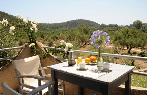 Karvelas Apartment | Cool, calm, and complete