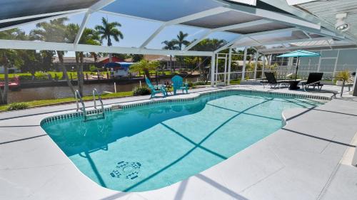 Fort Myers Villa | Coral Sunshine - large south terrace with poolspa