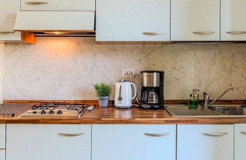 Musso Apartment | Cosy apartment for 4 guests with WIFI, A/C, pool, TV, terrace and parking