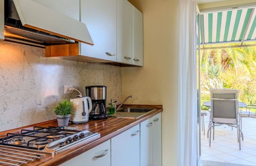 Musso Apartment | Cosy apartment for 4 guests with WIFI, A/C, pool, TV, terrace and parking