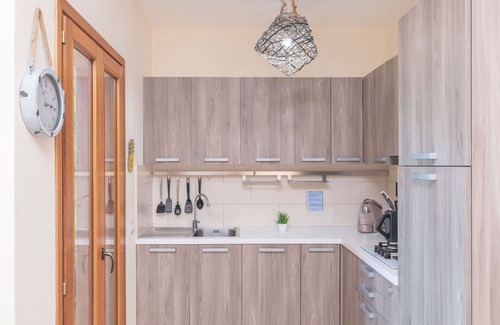 Porto Pozzo Apartment | Cosy apartment for 4 guests with pool, WIFI, A/C, terrace and pets allowed