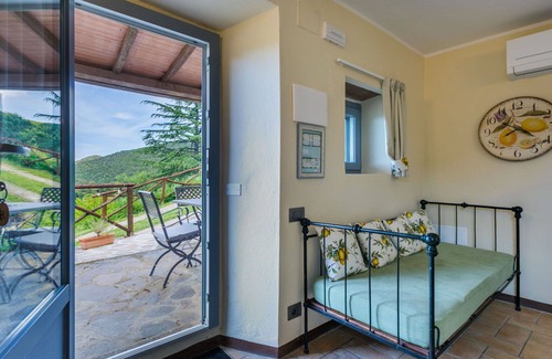 Castagneto Carducci Villa | Cosy apartment in villa for 5 guests with pool, A/C, WIFI, patio and pets allowed