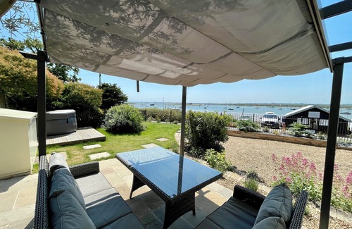 West Mersea House | Cosy Coastal 2-Bedroom Cottage with Hot Tub & Log Burner