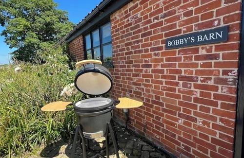 Farningham House | Cosy family friendly barn near Southwold