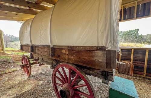 Floyd RV Rental | Covered Wagon Overlooking Pond