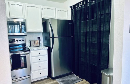 South Salt Lake Condo | Cozy 2-bedroom condo with AC, nestled in South Salt Lake City.